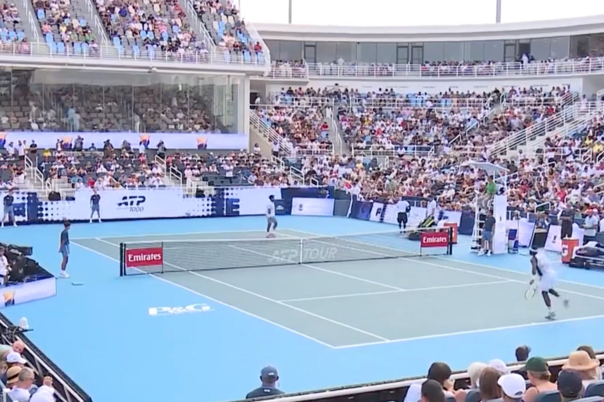 Packed tennis stadium court surrounded by fans during a match at the 2026 Cincinnati Open.