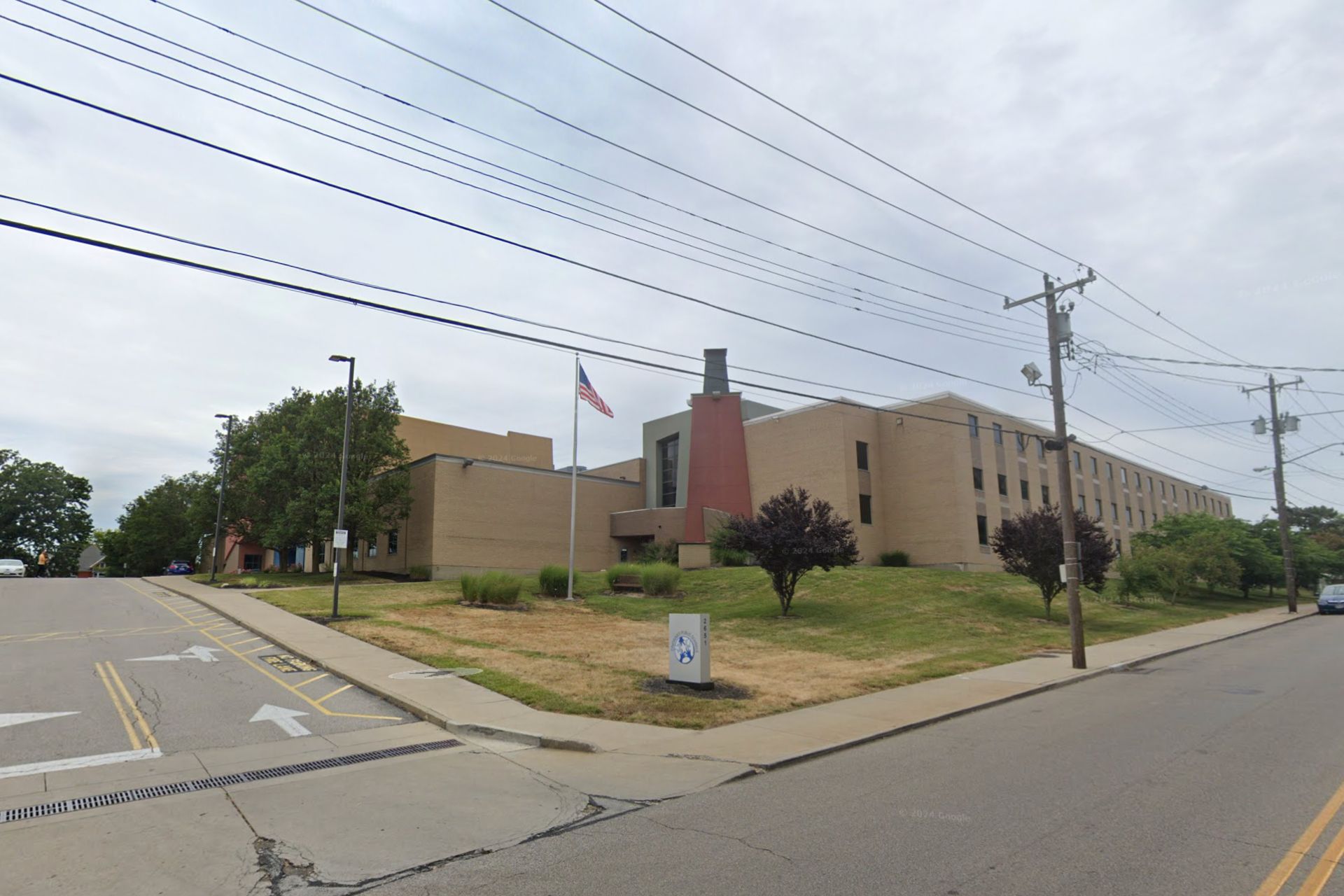 xterior view of a Cincinnati Public Schools building along a street corner.