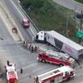 2 rescued after semi-truck crashes into I-71 overpass wall, police says