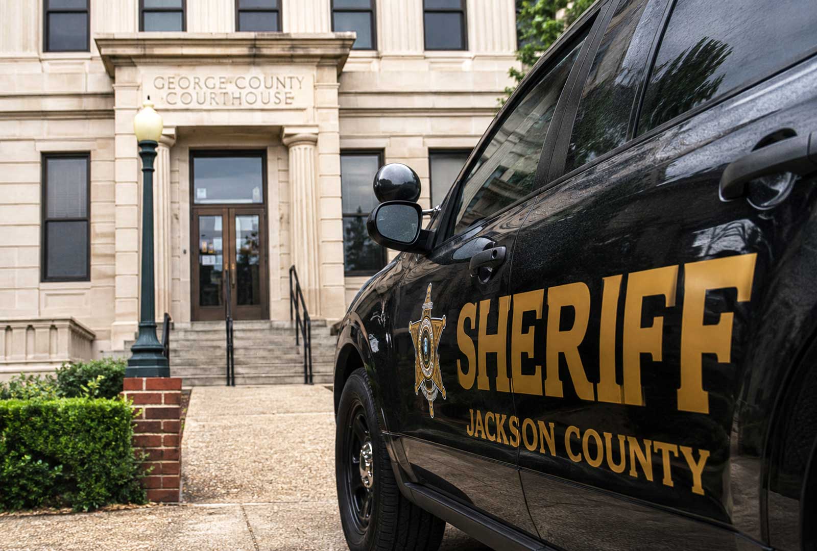 Jackson County Sheriff's vehicle parked outside the George County Courthouse during the investigation into the West Price Hill bomb threats that led to federal charges against a Cincinnati woman.