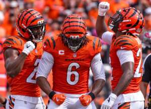 Bengals defensive rebuild celebrates a turnover during Cincinnati’s win over Tampa Bay.