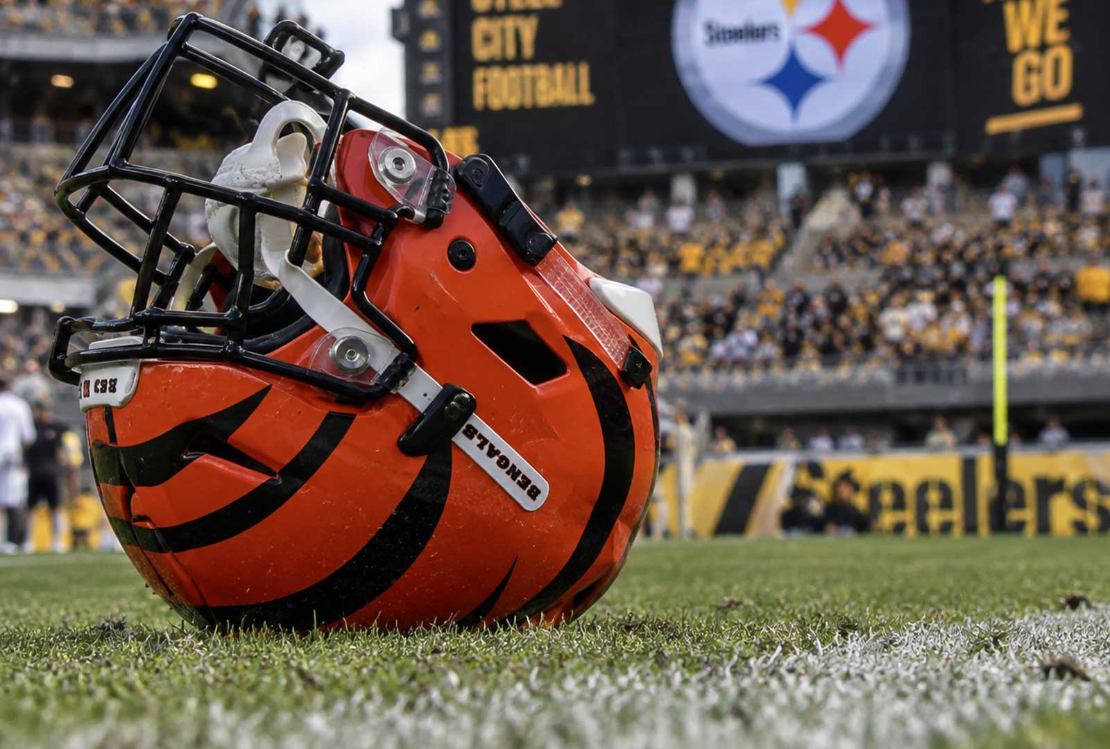 Bengals special teams helmet on the field at Acrisure Stadium after Cincinnati’s loss to Pittsburgh