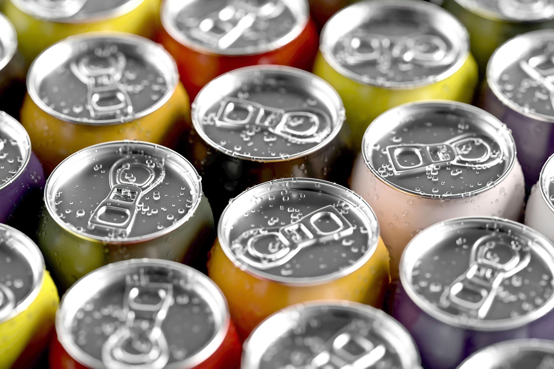 Rows of canned sugary soft drinks representing proposed SNAP policy changes in Ohio.